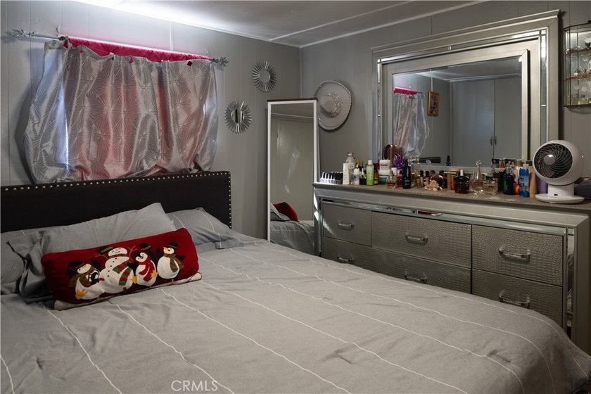 Ready to move in! This affordable, low land lease mobile home in - photo 18