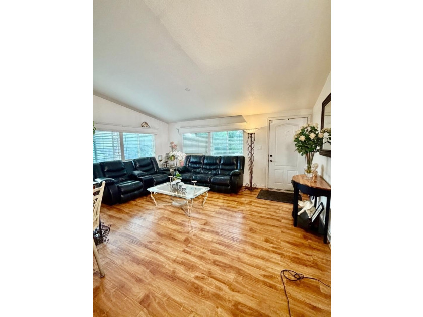 Welcome to this charming 3-bedroom, 2-bathroom home in the - photo 3