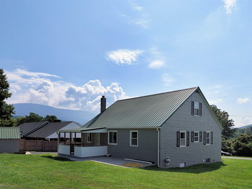 Filled w/ character &amp; charm, this beautifully updated - photo 7
