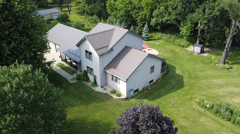 Beautiful rural 4 bedroom home! 2.38 wooded private acres not - photo 3