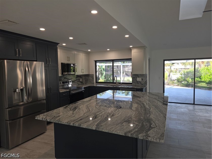 Recently Updated ,Bath,Kitchen ,Flooring/Water views/Large under - photo 2