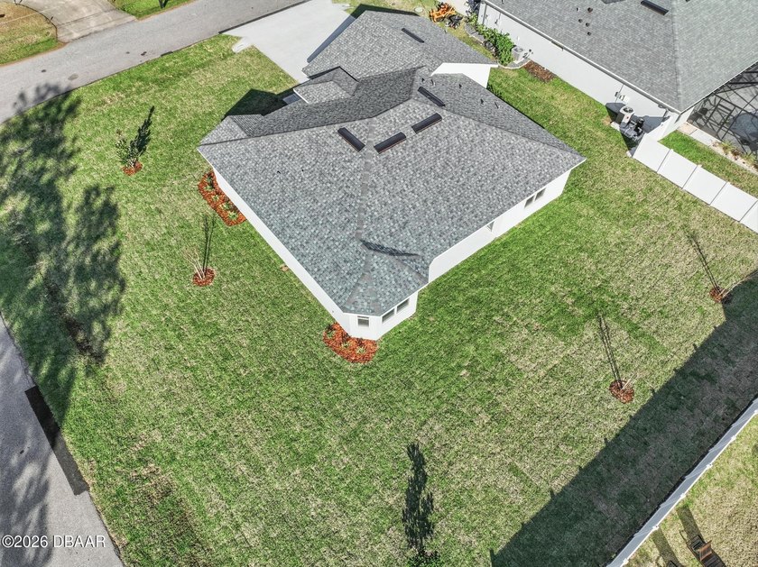 Enjoy spacious living with 10-foot ceilings and a bright, open - photo 8