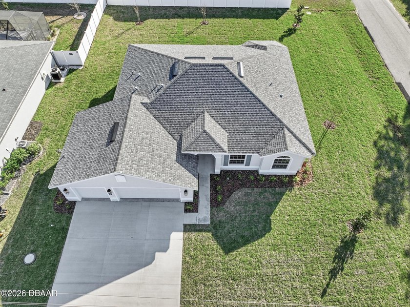 Enjoy spacious living with 10-foot ceilings and a bright, open - photo 3