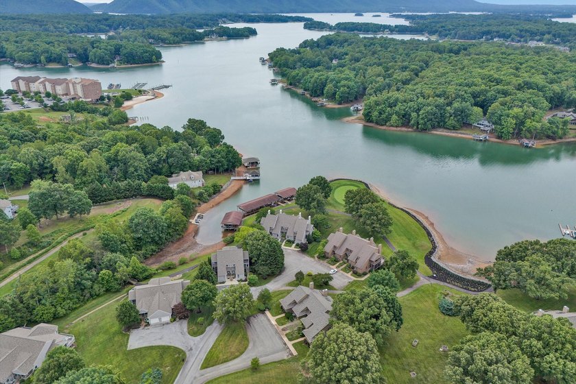 Experience carefree lake living in this beautifully maintained - photo 2