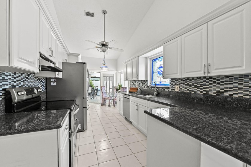 Welcome to 8372 Myakka Court, a beautifully updated 3-bedroom - photo 11
