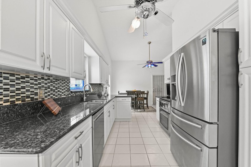 Welcome to 8372 Myakka Court, a beautifully updated 3-bedroom - photo 13