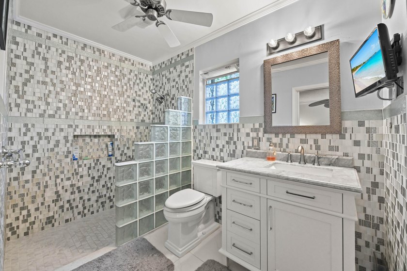 Welcome to 8372 Myakka Court, a beautifully updated 3-bedroom - photo 21