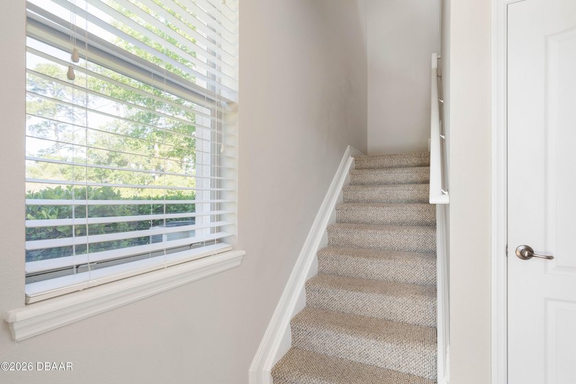 Perched on the top floor for ultimate privacy, this beautifully - photo 10