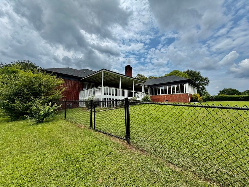 Welcome to a home where timeless craftsmanship, peaceful - photo 12