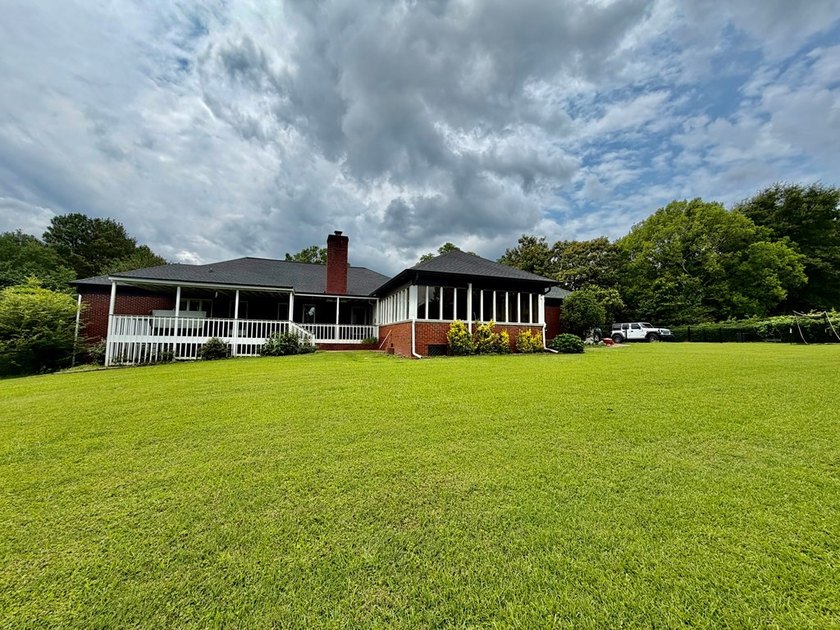 Welcome to a home where timeless craftsmanship, peaceful - photo 14