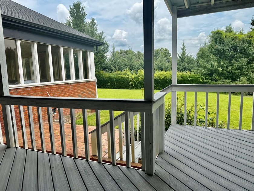 Welcome to a home where timeless craftsmanship, peaceful - photo 17