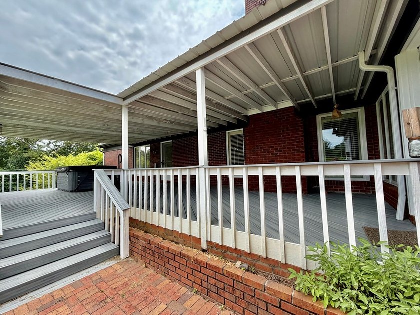 Welcome to a home where timeless craftsmanship, peaceful - photo 18