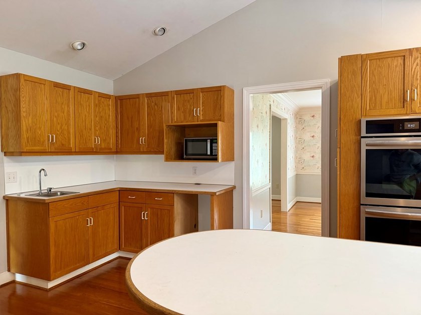 Welcome to a home where timeless craftsmanship, peaceful - photo 32