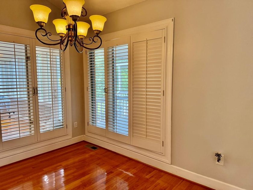 Welcome to a home where timeless craftsmanship, peaceful - photo 49