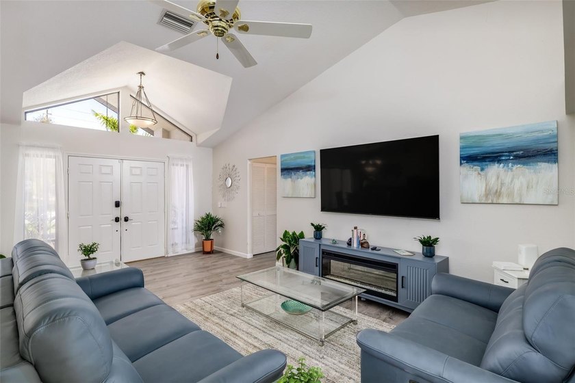 Contemporary style defines this recently remodeled 3 bedroom, 3 - photo 3
