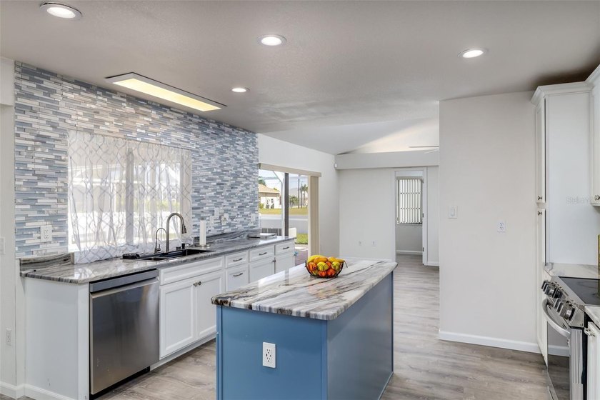 Contemporary style defines this recently remodeled 3 bedroom, 3 - photo 8