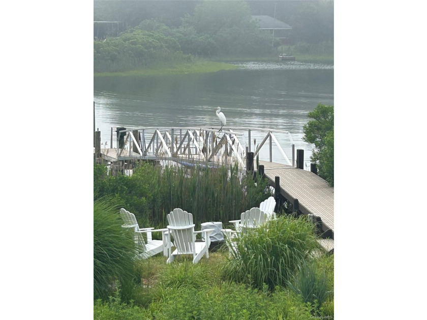 Perfectly sited on a protected inlet on West Lake, with direct - photo 35