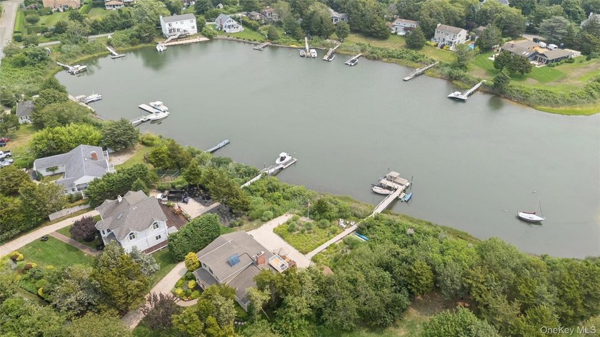 Perfectly sited on a protected inlet on West Lake, with direct - photo 44