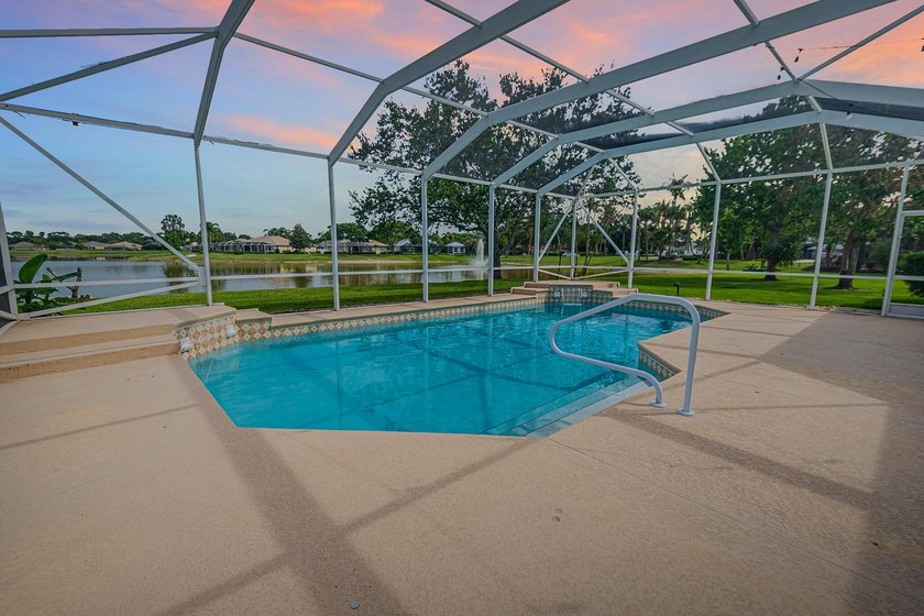 Enjoy stunning lake and pool views from this beautifully - photo 2