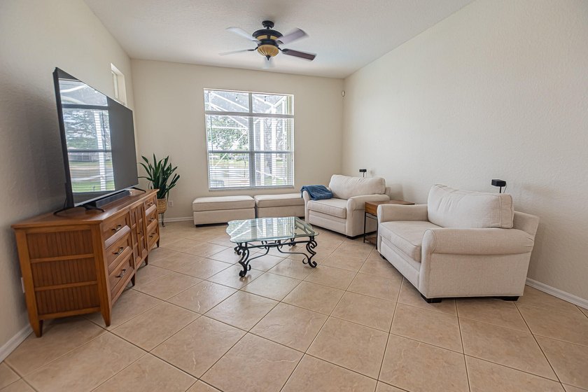 Enjoy stunning lake and pool views from this beautifully - photo 4