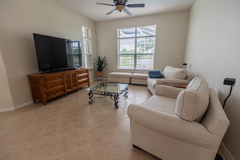 Enjoy stunning lake and pool views from this beautifully - photo 5