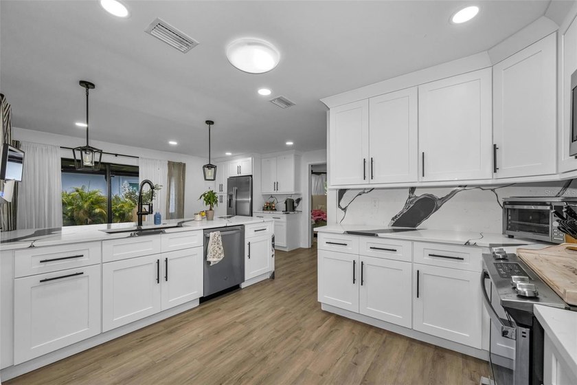 Completely renovated and move-in ready! Situated on two spacious - photo 3
