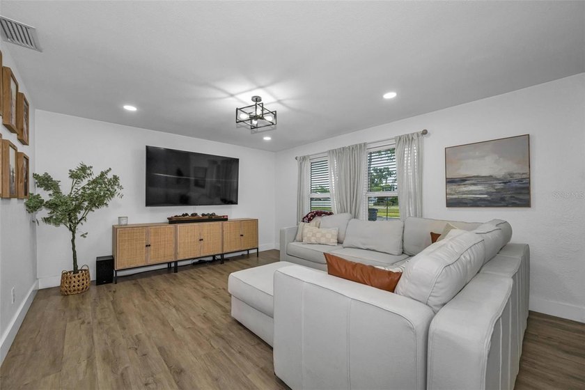 Completely renovated and move-in ready! Situated on two spacious - photo 10