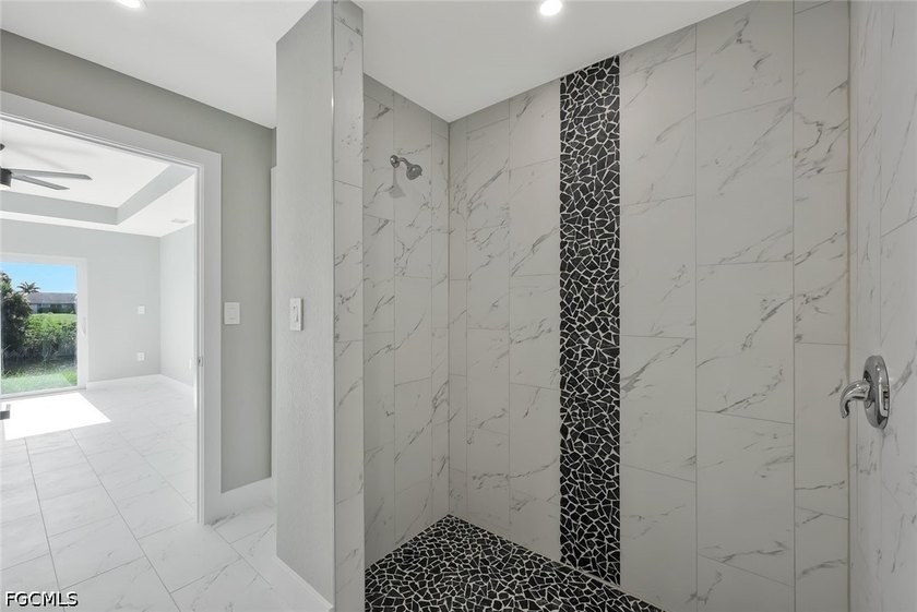 This like-new construction home offers four bedrooms and three - photo 8