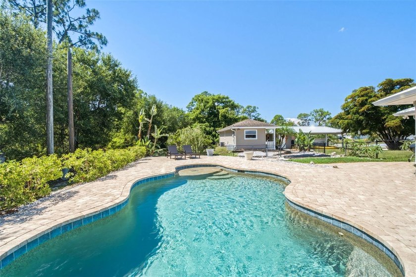 A RARE ESTATE-STYLE OFFERING: TWO RESIDENCES, SALTWATER POOL - photo 3