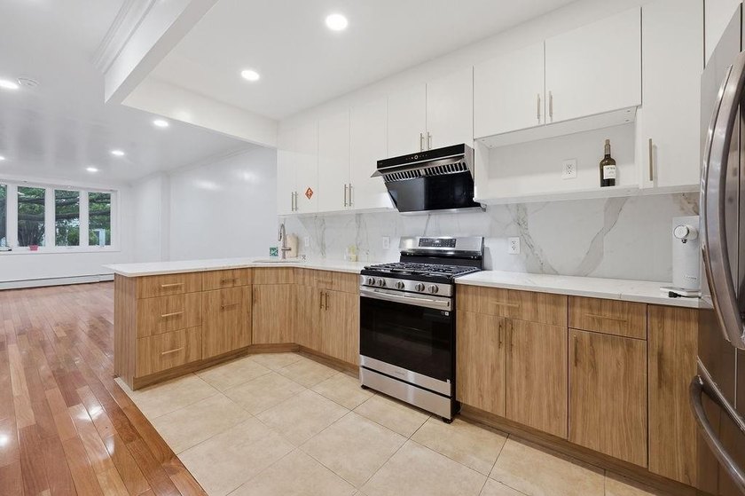 Welcome to this well-maintained semi-detached 2-family home in - photo 11