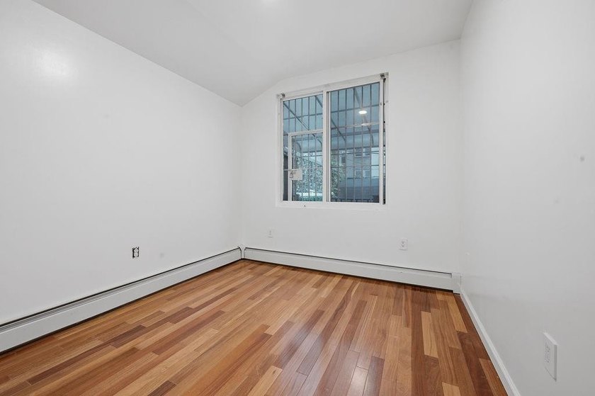 Welcome to this well-maintained semi-detached 2-family home in - photo 14