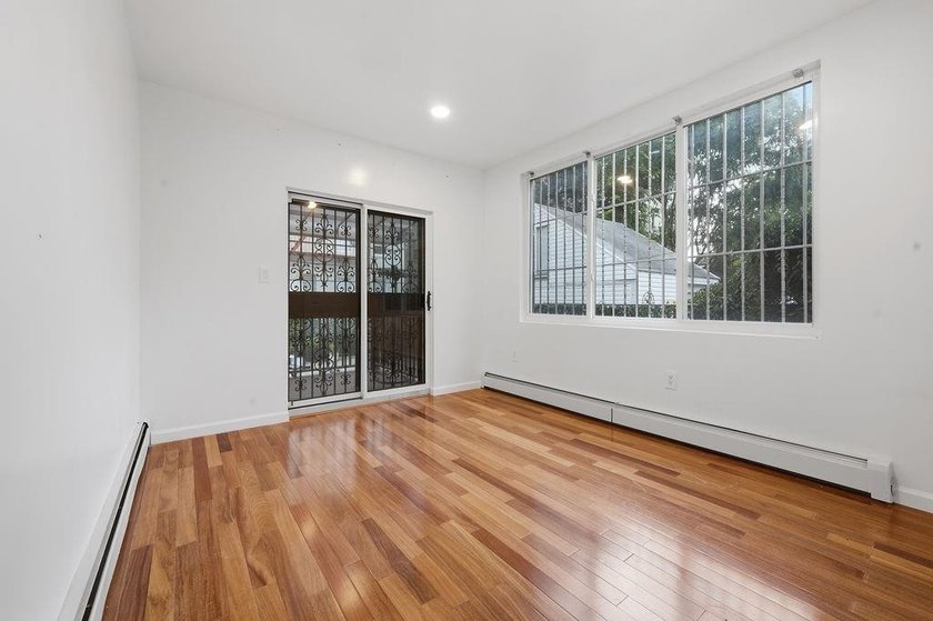 Welcome to this well-maintained semi-detached 2-family home in - photo 15