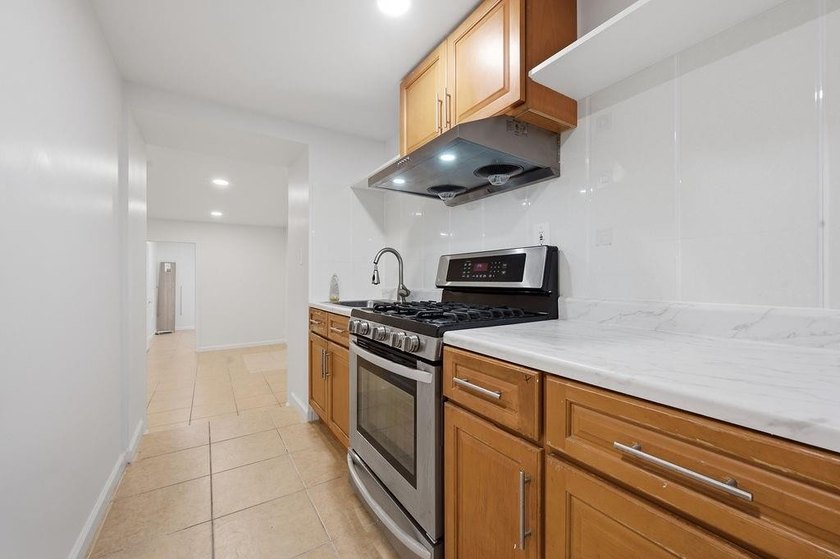 Welcome to this well-maintained semi-detached 2-family home in - photo 18