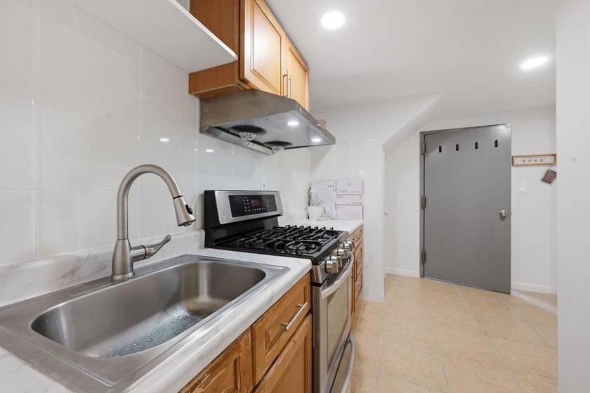 Welcome to this well-maintained semi-detached 2-family home in - photo 19