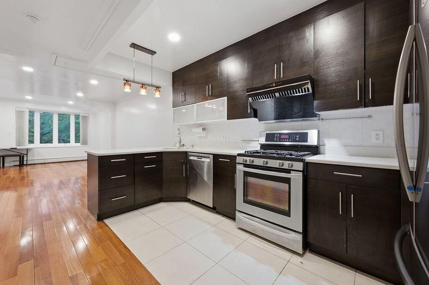 Welcome to this well-maintained semi-detached 2-family home in - photo 32