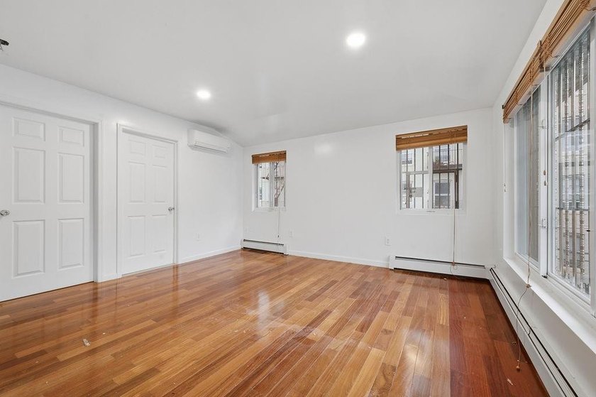 Welcome to this well-maintained semi-detached 2-family home in - photo 36