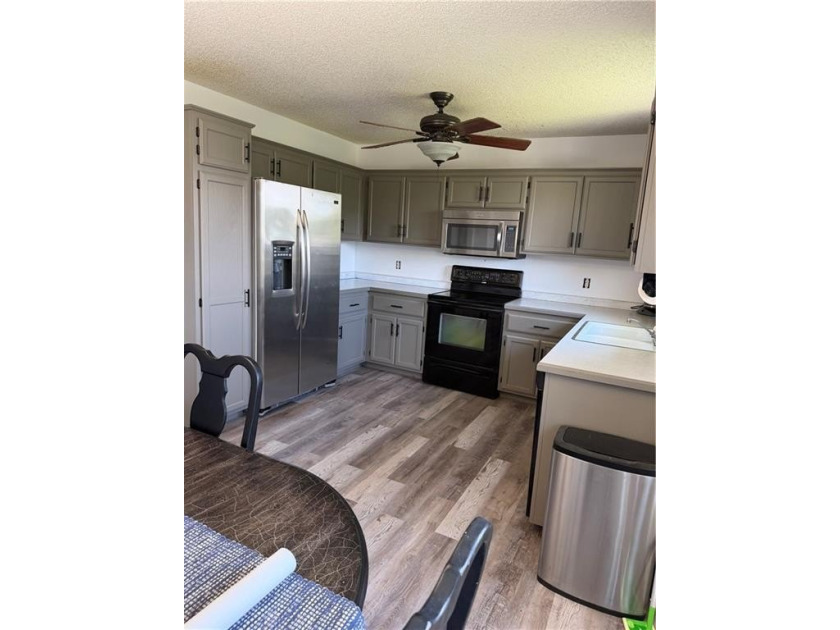 With some TLC, this home has potential to truly shine! Don't - photo 2