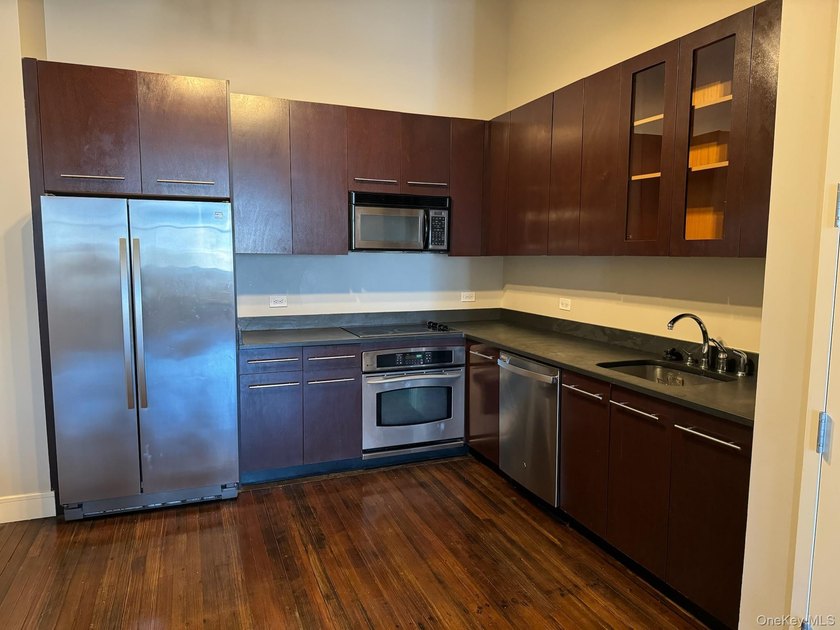 INVESTOR-FRIENDLY UNIT - TENANT IN PLACE UNTIL JULY 2027 ($2 - photo 8