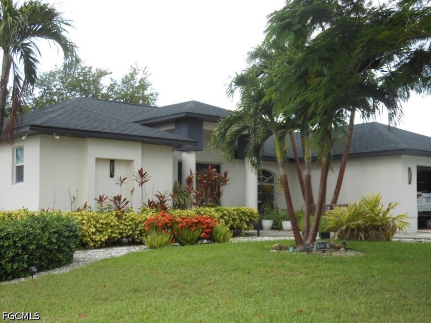 Welcome to 1236 Everest Pkwy, Cape Coral, FL 33904-a beautifully - photo 3