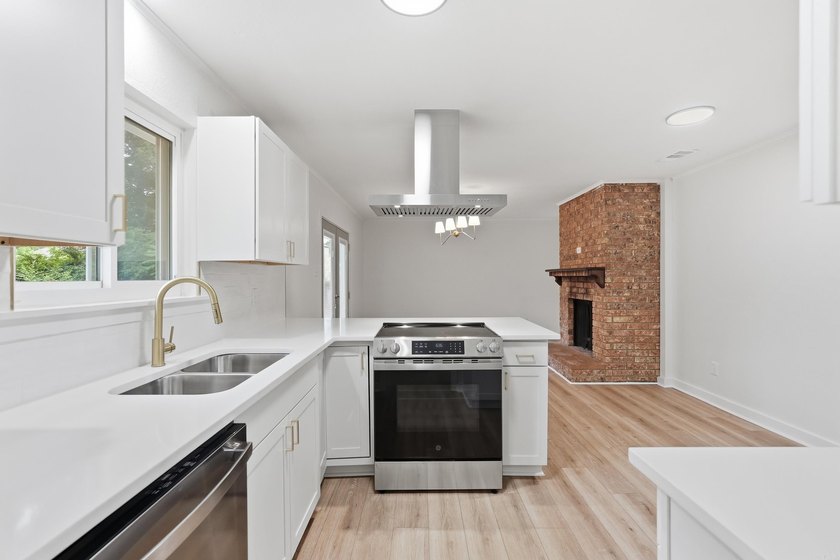 Welcome home to this beautifully updated property featuring - photo 4