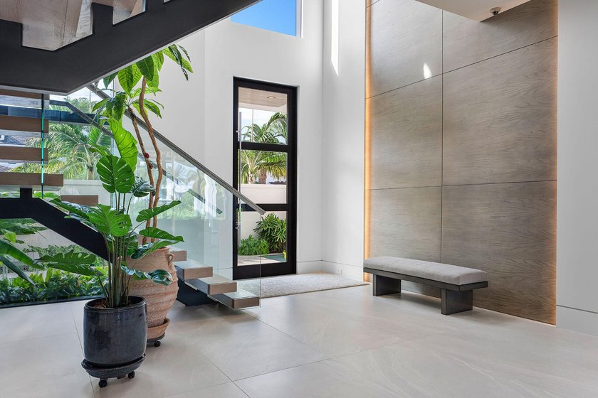 A masterpiece of modern waterfront living, this nearly new 2024 - photo 11