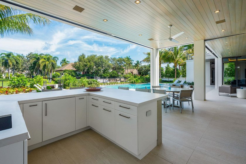 A masterpiece of modern waterfront living, this nearly new 2024 - photo 26