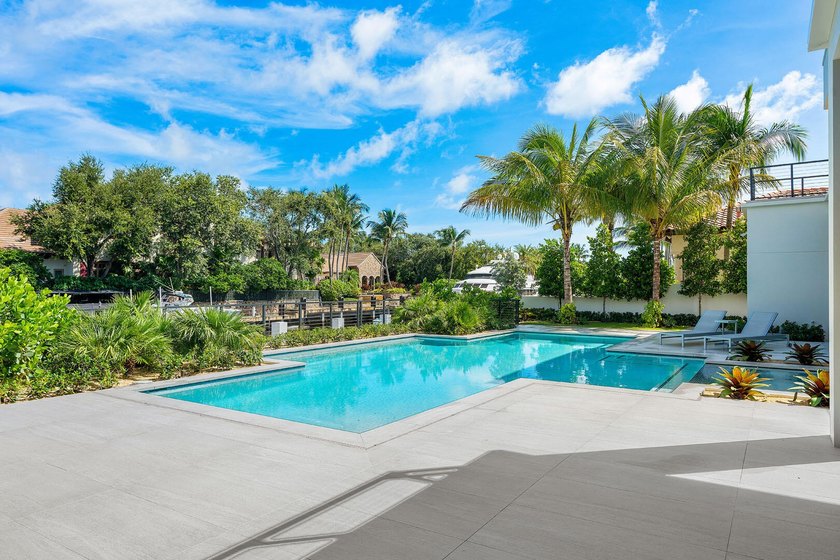 A masterpiece of modern waterfront living, this nearly new 2024 - photo 27