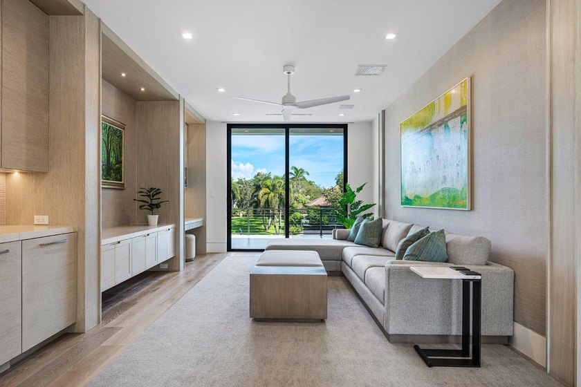 A masterpiece of modern waterfront living, this nearly new 2024 - photo 49