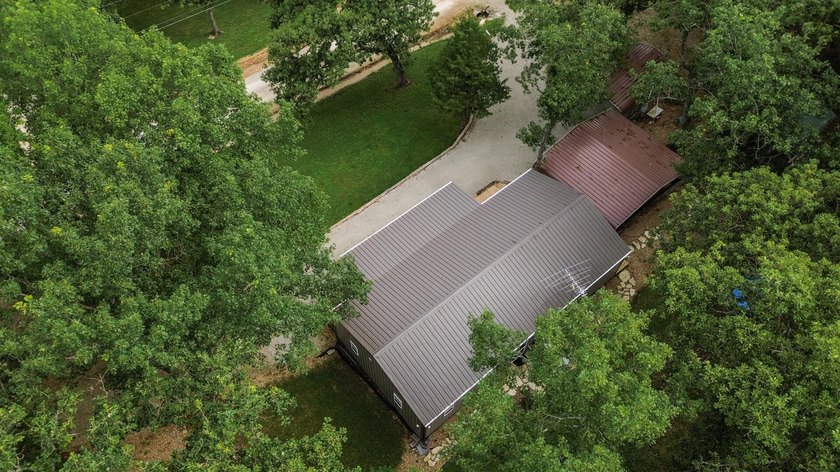 Escape to the lake with this charming 3-bedroom, 1.5-bath cabin - photo 3