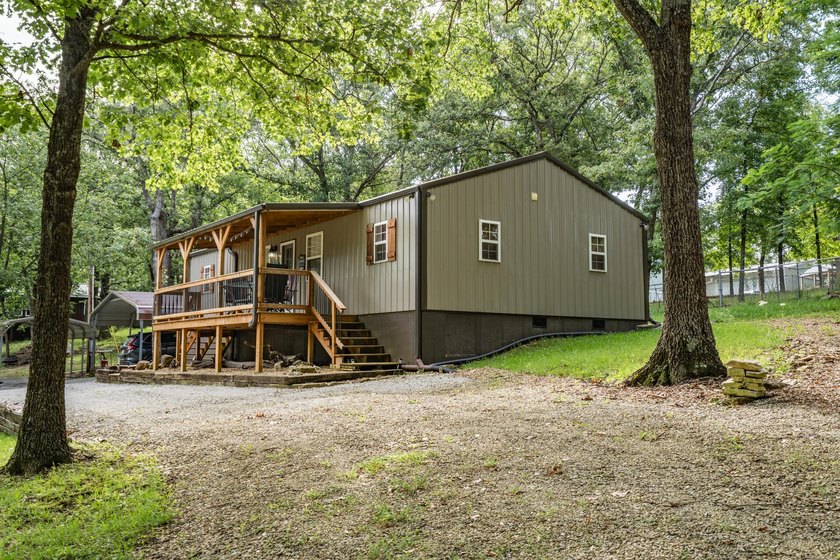 Escape to the lake with this charming 3-bedroom, 1.5-bath cabin - photo 6