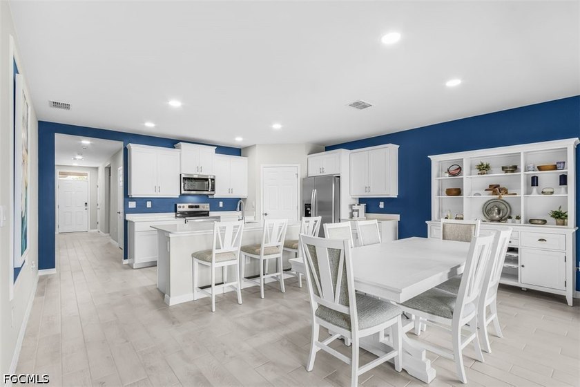 Built in 2025, this upgraded lakefront Cali floor plan offers 4 - photo 8