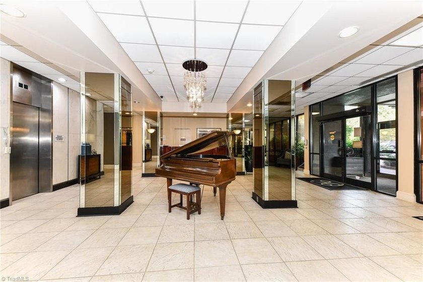 Located on the 8th floor of The Hampshire Unit 805 is a two - photo 3
