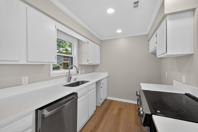 Enjoy effortless lakefront living in this beautifully remodeled - photo 3