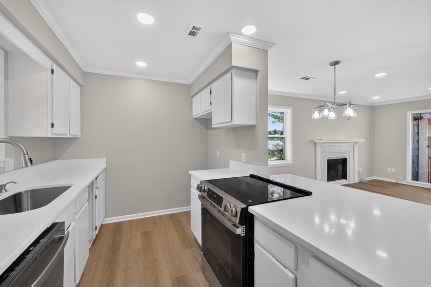 Enjoy effortless lakefront living in this beautifully remodeled - photo 4